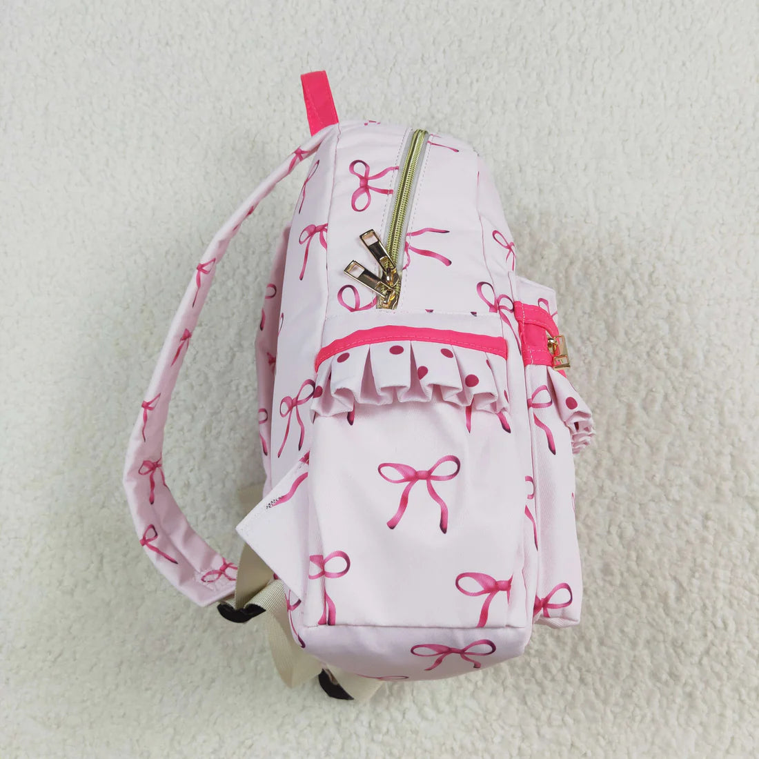 Ruffle bow backpack